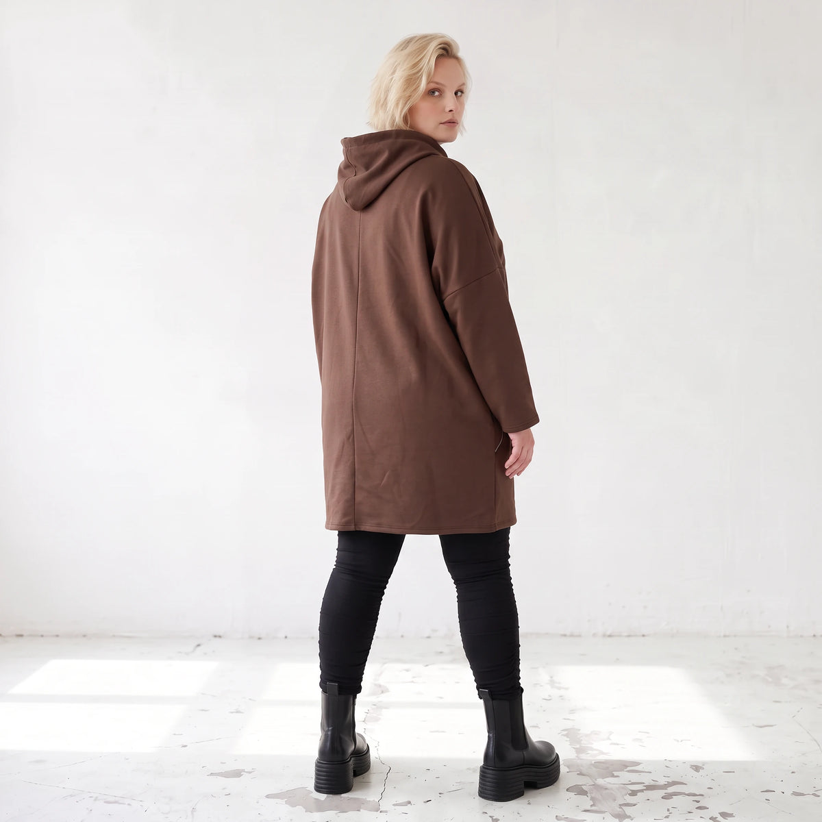 Kuscheliger Fleecehoodie mit Kapuze Tunnelzug Seitentaschen und Stretch in Geradschnitt