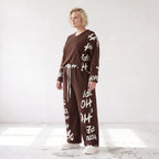 Braune Fleece Ballonhose mit Stretch Schnürbund und Taschen für winterlichen Komfort