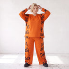 Fleeceshirt in Rost mit V-Ausschnitt geradem Schnitt und Stretch weich und winterwarm