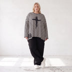 A-Linie Langarmshirt aus feinem Stretchjersey in Schwarz/Weiß mit seitlichen Schlitzen