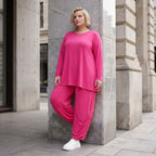 Pinkes Langarmshirt in Glockenform aus softer Slinkyqualität mit Rundhalsausschnitt
