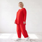 Rotes Langarmshirt aus Slinkystoff mit Stretch in glockiger Form und Rundhalsausschnitt