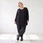 Langarmshirt in Glockenform aus Stretchjersey mit Rundhalsausschnitt und Nahttaschen