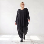 Langarmshirt in Glockenform aus Stretchjersey mit Rundhalsausschnitt und Nahttaschen