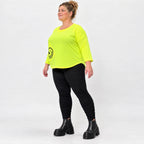 Neongelbes Shirt aus weichem Baumwolljersey mit Rundhalsausschnitt 7/8-Arm und Taschen