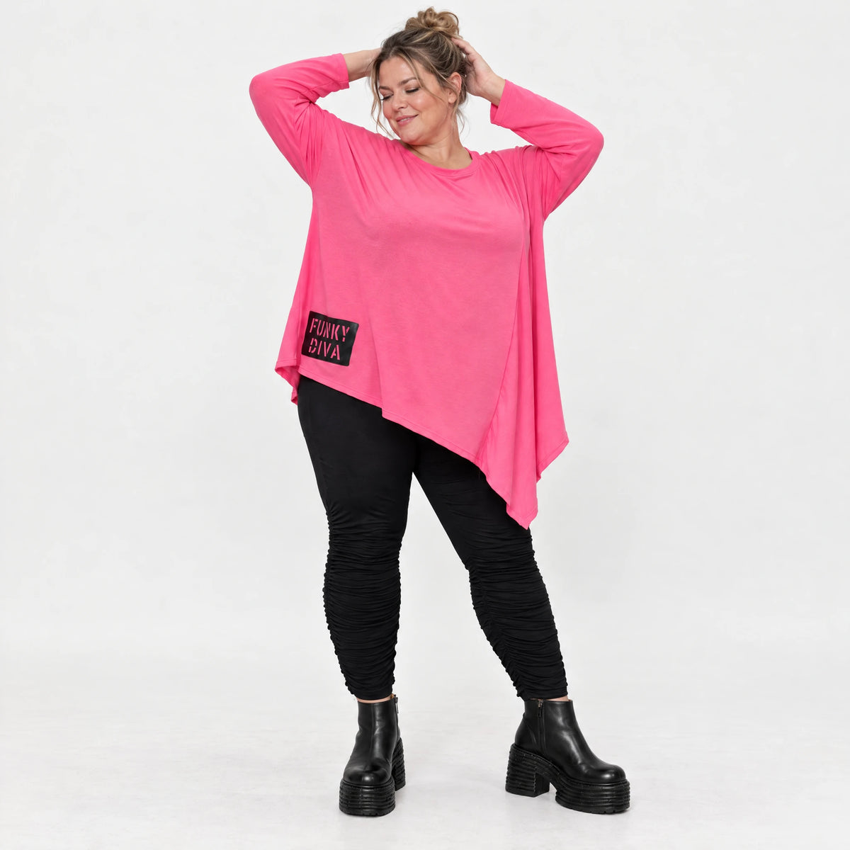 Langarmshirt in frischem Pink mit asymmetrischem Zipfelsaum aus weichem Stretchjersey