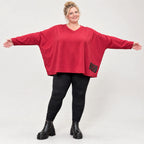 Rotes Langarmshirt aus weichem Stretchjersey mit V-Ausschnitt und kastiger Passform