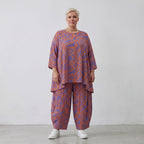 Lilaoranges Blütenshirt in A-Form mit Rundhals lockerer Passform und Dreiviertelärmeln