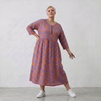 Ballonkleid in lilaorange Floralprint mit Seitentaschen Rundhals und Dreiviertelarm
