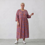 Ballonkleid in lilaorange Floralprint mit Seitentaschen Rundhals und Dreiviertelarm