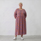 Ballonkleid in lilaorange Floralprint mit Seitentaschen Rundhals und Dreiviertelarm