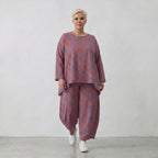Kastiges Bigshirt in Lila Orange mit Blumendruck Leinenoptik und längerem Rückenteil