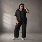 Zeitlose luftige schwarze Leinenhose im Lagenlook mit Strickdetails leger und ausgefallen