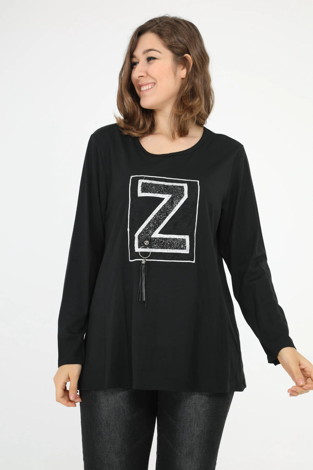  Schickes Langarm-Shirt in Schwarz-Weiß mit glitzernden Applikationen für Curvy Mode