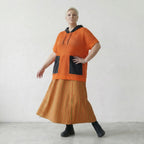 Zeitlos legeres Lagenlook Shirt aus feinem Baumwollstrick mit ausgefallener Lochstruktur, Orange/Schwarz