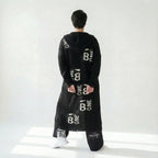 Oversize Grobstrick Cardigan mit Schrift Applikationen Übergang B One Damenmode jetzt bei Modeare entdecken