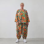 Luftiges Oversized Shirt in frischem Apfelgrün mit Vokuhila Schnitt aus Viskose Leinen