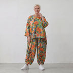 Luftiges Oversized Shirt in frischem Apfelgrün mit Vokuhila Schnitt aus Viskose Leinen