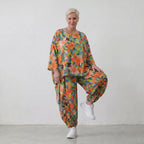 Luftiges Oversized Shirt in frischem Apfelgrün mit Vokuhila Schnitt aus Viskose Leinen