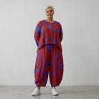Leichte Popelinejacke in Rotlila mit Klecksmuster schimmerndem Look und langem Saum
