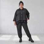 Schwarze Karottenhose aus Stretchdenim mit Elastikbund und Seitentaschen weich bequem