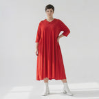Ballonkleid mit Kragen Dreiviertelarm Seitennahttaschen und VCut aus softem Materialmix