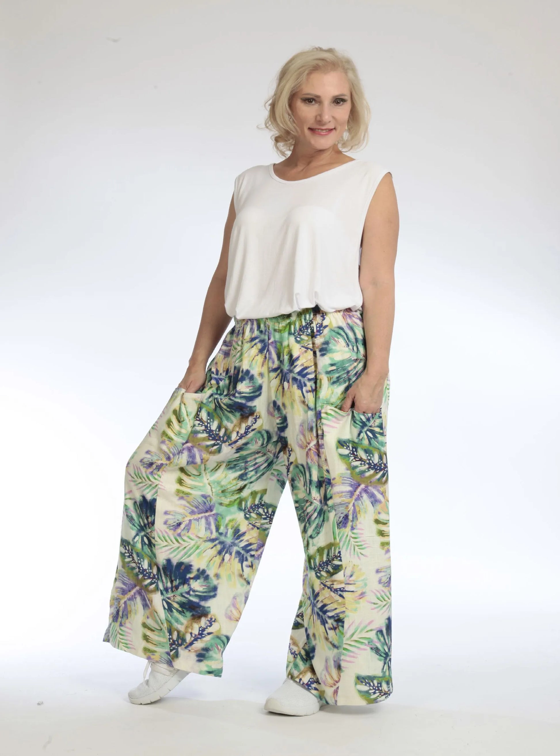  Luftige Ballonhose in frischem Grün mit floralem Muster und lässigem Oversize-Fit für den Sommer