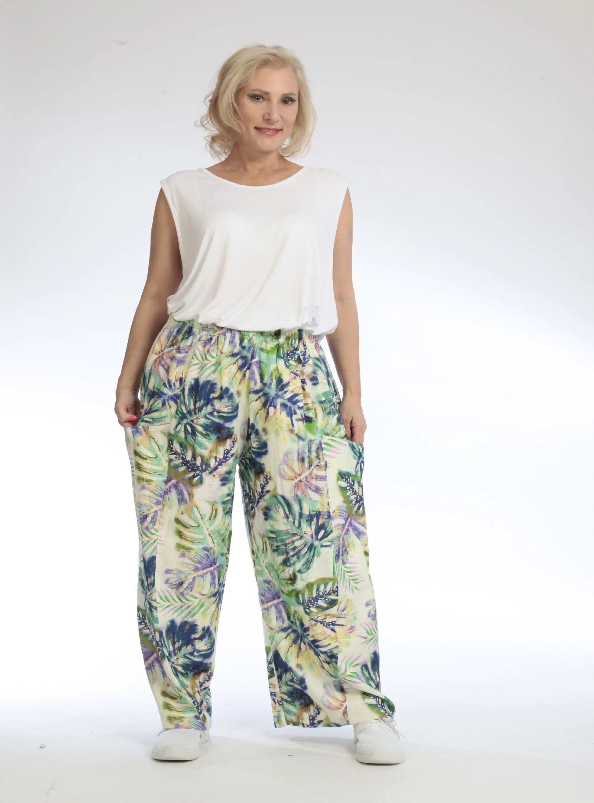  Luftige Ballonhose in frischem Grün mit floralem Muster und lässigem Oversize-Fit für den Sommer